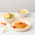 miniware-first-bite-set-pla-cereal-suction-bowl-vanilla-silicone-spoon-and-cover-in-aqua- (7)